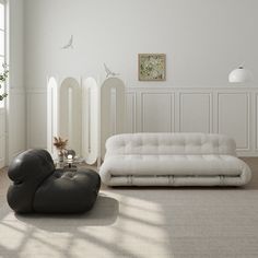 a living room with white walls and furniture