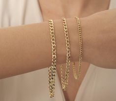 Material: Gold Carat: 14K (585) Solid Gold   14K Miami Cuban Chain Bracelet, Real Gold Cuban Link Chain,14K Gold 2.15mm 2.90mm 3.80mm Bracelet, Gold Curb Bracelet, Unisex Chain Bracelet   -- Details 14K Solid Gold Plated is Not Gold it is Real Solid Gold Gold Color Options; Material: Solid Gold Karat: 14 K (585) Chain width: 2.15mm 2.90mm 3.50mm - - Express shipping * United States: 4-6 business days * Canada: 4-6 business days * Europe: 4-6 business days * Australia: 4-6 business days * UK: 4-6 Cuban Chain Bracelet, Curb Bracelet, Gold Cuban Link Chain, Armband Gold, Miami Cuban, Cuban Link Chain, Cuban Chain, Cuban Link, Lovely Jewellery