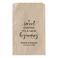 a paper bag with the words sweet ending to a new beginning printed on it, in black ink