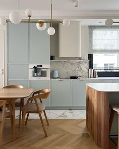 the kitchen is clean and ready to be used as a dining room or living room