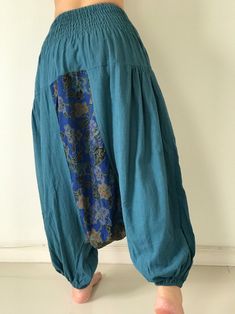 "⬇️ SHOP HERE https://www.etsy.com/ch-en/shop/IndycraftsDesigns Aladdin Pants, Harem Pants 100% Cotton Unisex pants, perfect for yoga, The fabric is cotton soft, lightweight, and airy, ideal for those warm days. If it's a bit chilly, you could always wear leggings underneath. super comfortable cotton pants made of light, comfortable to wear 100% cotton. Cotton is a natural material that wicks moisture to keep you cool, comfy & dry. Floral printed, elastic waistband,medium-weight, Soft and Co Baggy Blue Patchwork Pants, Blue Baggy Patchwork Pants, Blue Patchwork Long Pants Bottoms, Baggy Patchwork Tapered Leg Pants, Baggy Patchwork Pants With Tapered Leg, Blue Patchwork Trousers, Blue Patchwork Pants, Blue Baggy Harem Pants With Tapered Leg, Bohemian Bottoms With Tapered Leg And Pockets