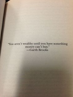 an open book with the quote you are really untidy until you have something money can't buy