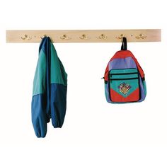 two backpacks hanging from hooks on a coat rack