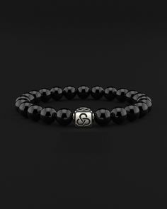 Experience simplicity at its finest with the Essential Bracelet. This piece embodies the elegance of minimalism, crafted for those who find beauty in understatement. It's a subtle yet powerful expression of self, perfect for visionaries who appreciate the grace in simplicity and make their mark with a quiet yet impactful presence. All our stones are chosen by hand to satisfy AAA quality standards. They are natural stones and their size and color can vary slightly. Stone: AAA Grade 8mm Metal: 925 Emotional Strength, Gold Vermeil Jewelry, Onyx Necklace, Onyx Bracelet, Vermeil Jewelry, Mens Beaded Bracelets, Black Rhodium, Onyx Stone, Polish Jewelry