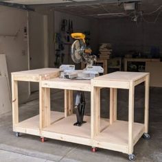 a workbench in a garage with tools on it