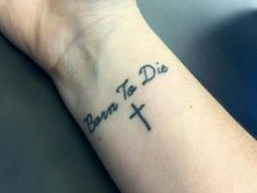 a wrist tattoo with the words born to die on it