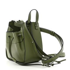 This is an authentic LOEWE Calfskin Mini Hammock Shoulder Bag in Avocado. This chic tote is crafted of grained leather in green. It features a unique one-piece reinforced design with leather top handles and an optional adjustable shoulder strap. The drawstring pulls on either side open to a beige fabric interior with patch pockets. Puzzle Bag, Beige Fabric, Pearl Grey, Bag Straps, Leather Top, Hammock, Electric Blue, Patch Pocket, Calf Skin