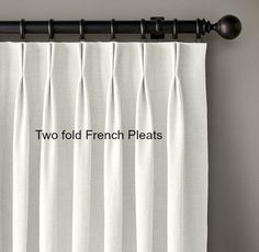 the words two fold french pleats are written in black on a white curtain rod