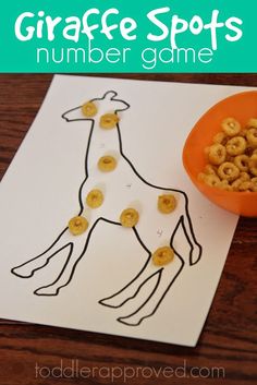 a giraffe spot is next to a bowl of cereal and a paper plate