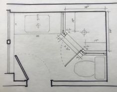 a drawing of a bathroom with toilet, sink and bathtub in the middle of it