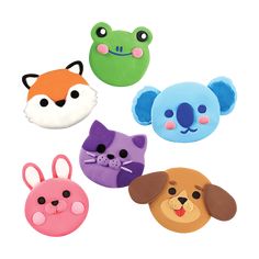 four different animal shaped erasers in various colors and shapes, including one with a face