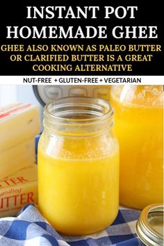 two jars filled with homemade cheese sitting on top of a blue and white checkered table cloth