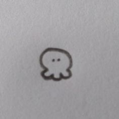 a drawing of an octopus on white paper