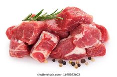 raw meat with spices and herbs on white background