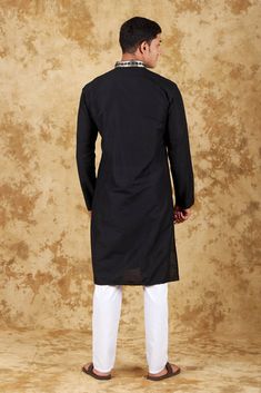 Bluesaanchi Mirror Magic Black Men's Kurta Set  The Bluesaanchi Mirror Magic Black Men's Kurta Set is a stylish and elegant addition to any man's wardrobe. Crafted with precision and designed for comfort, this kurta set is perfect for festive occasions, weddings, or casual gatherings. The intricate mirror work adds a touch of sophistication, making it a standout piece. Pair it with traditional footwear for a complete look.  Key Features  Elegant black color with intricate mirror work.  Comfortable fit with breathable fabric.  Ideal for festive occasions and casual gatherings.  Comes with matching bottoms for a complete look.   Specifications  Product Type: Kurta Set  Brand: Bluesaanchi  Color: Black  Size Range: Available in multiple sizes   Material & Care  Material: High-quality cotton f Unstitched Cotton Churidar, Formal Cotton Kurta For Festivals, Formal Festival Cotton Kurta, Cotton Nehru Jacket For Eid, Cotton Bandhgala With Dabka For Puja, Black Churidar For Eid, Handloom Sherwani With Straight Kurta, Traditional Black Cotton Nehru Jacket, Formal Cotton Traditional Wear Straight Kurta