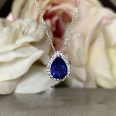 Sleek sellouts! 🤓. Order Blue Sapphire and Moissanite Halo Pendant Necklace, Diamond Halo Pear Shape Blue Sapphire Necklace Blue Sapphire Pendant Gold Necklace #7276 at $650.00 #BlackFridaySale #SapphirePendant #NecklaceBlue #MoissaniteDiamond #SapphireNecklace #HaloPendant #DiamondHalo #GoldNecklace #PearShape #BlueSapphire Sapphire Stone Necklace, Light Blue Sapphire Necklace, Sapphire Pear-shaped Gemstone Necklace, Blue Teardrop Pendant Necklace Fine Jewelry, Blue Teardrop Pendant Fine Necklace, Blue Sapphire Drop Necklaces, Blue Pear-shaped Drop Necklace For Gift, Pear Shaped Sapphire Necklace As Gift, Pear Shaped Sapphire Necklace For Gift