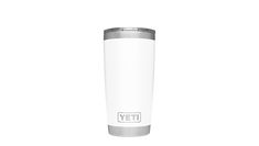 the yeti travel mug is white and has a silver trim around the bottom half