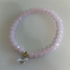 This Is A Very Pretty Pale Pink Bracelet To Wear Alone Or For Stacking. Hand Made With Stretchy Cord To Fit Most Wrists. No Tags But Brand New. Check Out My Other Bracelets To Bundle & Save On Shipping. Elegant Beaded Heart-shaped Stretch Bracelet, Adjustable Crystal Heart Bracelet With Charm, Adjustable Heart Crystal Bracelet With Heart Charm, Heart-shaped Bracelets With Faceted Beads For Gifts, Heart Shaped Bracelets With Faceted Beads For Gifts, Heart-shaped Bracelet With Faceted Beads For Gifts, Heart-shaped Faceted Beads Bracelet Gift, Elegant Heart-shaped Crystal Bracelet With Heart Beads, White Heart-shaped Adjustable Crystal Bracelet