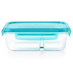 a glass container with blue lid and two separate compartments on the top, sitting on a white surface