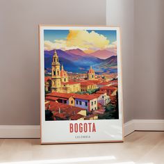 a poster is sitting on the floor in front of a wall with an image of a city