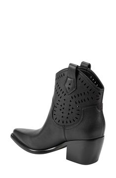 A notched topline, decorative cutouts and twin pull-tabs bring Western-inspired style to this leather boot raised on a walkable stacked heel. 2 1/2" heel (size 8.5) 5 1/2" shaft Leather upper/synthetic lining and sole Imported Western Black Boots With Heel Pull Tab, Black Mid Calf Western Boots, Black Western Boots With Rivets, Black Western Mid-calf Boots With Wide Calf, Black Western Mid-calf Boots Medium Width, Dolce Vita Shoes, Western Boots Women, Designer Crossbody Bags, Western Boot