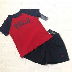 Nwt Polo Ralph Lauren Short Set. Elastic Waist Navy Shorts With Signature Horse. Raglan Style Tee In Red And Navy. Retails $52 Smoke + Pet Free Home Ships 1-2 Days Navy Casual Playwear Sets, Casual Navy Playwear Sets, Ralph Lauren Summer T-shirt With Short Sleeves, Classic Ralph Lauren Short Sleeve T-shirt, Blue Ralph Lauren Crew Neck T-shirt, Navy Sporty Moisture-wicking Polo Shirt, Ralph Lauren Short Sleeve Logo T-shirt, Polo Ralph Lauren Shorts, Ralph Lauren Shorts