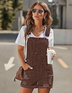 Best Seller // Show off your classic style wearing this brown adjustable straps denim bib ripped shorts overall.