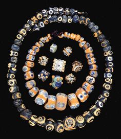 A COLLECTION OF MEDITERRANEAN GLASS EYE BEADS -  PHOENICIAN OR CARTHAGINIAN, CIRCA 6TH-2ND CENTURY B.C. Beads Pictures, African Trade Beads, Carthage, Vintage Beads, Eye Beads