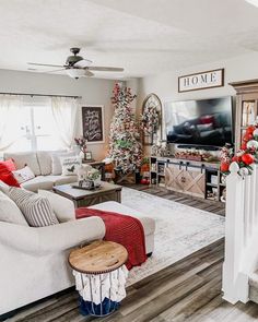 the living room is decorated for christmas with red, white and blue decor