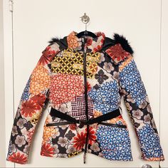 Desigual Patterned Puffer Coat. Size 38 = Small Excellent Condition. No Visible Flaws -Belt For Cinched Waist Design -Fur Hood (Not Detachable) -Fun, Bright Pattern Measurements Available Upon Request. Offers Always Welcome! Chic Multicolor Patchwork Outerwear, Multicolor Quilted Spring Outerwear, Designer Fall Floral Print Outerwear, Designer Floral Print Fall Outerwear, Fitted Winter Outerwear With Floral Print, Winter Floral Print Fitted Outerwear, Winter Red Floral Print Outerwear, Red Floral Print Winter Outerwear, Fitted Multicolor Winter Outerwear