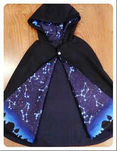 Star Themed Clothing, Astronomer Aesthetic Outfit, Space Theme Clothes, Spacecore Outfits Male, Spacecore Clothes, Space Cloak, Moon Themed Clothes, Types Of Cloaks, Starry Cloak