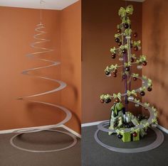 a christmas tree in the corner of a room with an orange wall and two different pictures