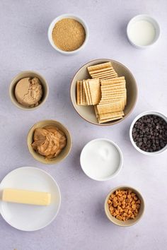 bowls filled with different types of food on top of a table