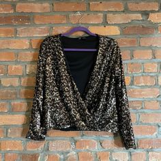 Brand New Without Tags Never Worn Size Small Open Ballerina Top (Need A Bralette Or Tank Underneath) Black, Brown, And Cream Sequined Leopard Print Long Sleeve This Is A Top To Be Seen In. Show Off On The Dance Floor, At A Birthday Dinner, Or On New Year’s Eve. #Newyears #Newyearseve #Sequins #Glitter Zara Sequined Long Sleeve Tops, Zara Long Sleeve Sequin Tops, Zara Fitted Sequin Blouse, Zara Long Sleeve Sequin Blouse, Zara Tops For Fall Party, Chic Zara Sequined Blouse, Zara Top For Night Out Party Season, Zara Party Tops For Fall, Zara Top For Party Night Out