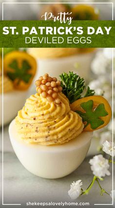 deviled eggs with mustard and garnishes on them for st patrick's day