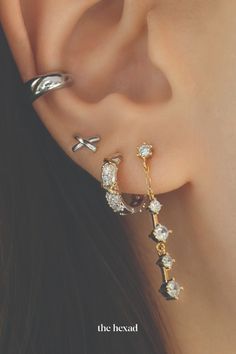 how to wear both gold and silver earrings at the same time? the Revolt huggies features both silver and gold elements in one earring. shop THEHEXAD Silver Huggie Earrings, Gold And Silver Earrings, Huggie Earrings Silver, Huggie Earrings, Gold Cross