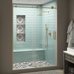 a walk in shower sitting next to a bathroom sink