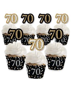 black and gold 70th birthday cupcake toppers with white frosting on each one