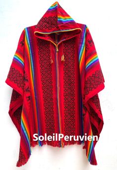 Hooded Poncho unisex, shaman Poncho, Peruvian traditional poncho, poncho bohemian, ethnic poncho wool blend. A beautiful wool-blend poncho with designs and colorful stripes. Thick and heavy to keep you warm. Made in the Sacred Valley of the Incas, Peru. MEASUREMENTS: 35 inches Length x 52 inches Width 89 centimeters Length x 133 centimeters Width MATERIAL: Wool Blend (Alpaca, Sheep wool and synthetic) SHIPPING DETAILS: *Shipping to destinations worldwide. *Once payment is received, the shipment Bohemian Hooded Cape For Festivals, Red Hooded Bohemian Poncho, Red Bohemian Hooded Poncho, Bohemian Multicolor Hooded Cape, Multicolor Bohemian Hooded Cape, Red Folk Style Poncho For Festival, Sacred Valley, Hooded Poncho, It Goes On