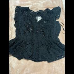 Never Worn Beautiful Express Top. Black V-neck Tops With Floral Embroidery, Black Embroidered V-neck Top For Summer, Chic Black Tops With Floral Embroidery, Black Embroidered Top For Spring, Black V-neck Embroidered Top For Summer, Casual Black Blouse With Floral Embroidery, Spring Black V-neck Embroidered Top, Black V-neck Embroidered Top For Spring, Casual Black Embroidered Top With Short Sleeves