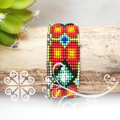 One of a kind bracelet s made with petite glass beads. Each design uses different shapes and colors, featuring a vibrant rainbow palette or just plain colors. Picture colors may slight different. Wide: 1 in Approximate length: 7 in Check out more items in our online store at: www.GuelaguetzaDesigns.com Unique Multicolor Tiny Bead Bracelets, Unique Colorful Beaded Bracelets, Colorful Unique Beaded Bracelets, Multicolor Faceted Beads Bracelet For Festival, Rainbow Beaded Bracelets With Large Beads As Gift, Colorful Beaded Bracelets With Large Beads As Gift, Handmade Multicolor Crystal Friendship Bracelet, Multicolor Faceted Beads Friendship Bracelets, Traditional Multicolor Faceted Beaded Bracelets