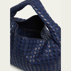 Bottega Veneta "Hop" hobo bag in denim intrecciato cotton and leather  Shoulder strap  Fold-over flap top with  Interior, one zip pocket  Approx. 9.4"H x 21.2"W x 5.1"D Made in Italy Casual Hobo Bag With Intrecciato Weave, Casual Hobo Bag With Intrecciato Weave For Shopping, Intrecciato Weave Hobo Shoulder Bag For On-the-go, Casual Intrecciato Hobo Bag For Shopping, Designer Blue Shoulder Bag With Woven Leather, Casual Top Handle Shoulder Bag With Intrecciato Weave, Casual Shoulder Bag With Intrecciato Weave And Top Handle, Designer Blue Woven Leather Shoulder Bag, Casual Shoulder Bag With Top Handle Intrecciato Weave