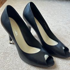 Size 39 Chanel Open Toe Lamb Skin Leather Black Heels. The Heel Has A Gold Cc Detail With Pearl Attachment. Like New! Box And Dust Bag Included. Chanel Open Toe, Chanel Pearl, Shoes Chanel, Chanel Pearls, Open Toe Shoes, Black Leather Heels, Toe Shoes, Chanel Shoes, Black Heels