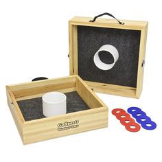 two wooden boxes with scissors and cups in them