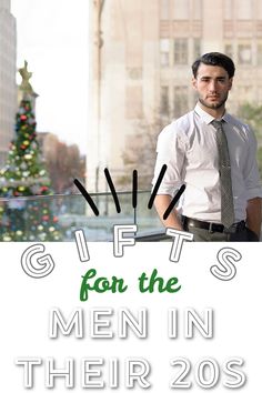 a man standing in front of a christmas tree with the words gifts for the men in their 20s