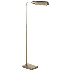 a lamp that is on top of a metal stand with a white wall in the background