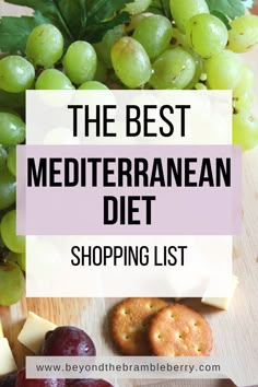 the best mediterranean diet shopping list with grapes, cheese and crackers on a cutting board