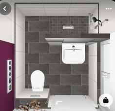 a bathroom with a toilet, sink and shower in it's center wall is shown