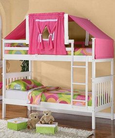 a white bunk bed with a pink tent on top