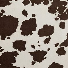 an animal print rug with brown spots on it's back side and white background